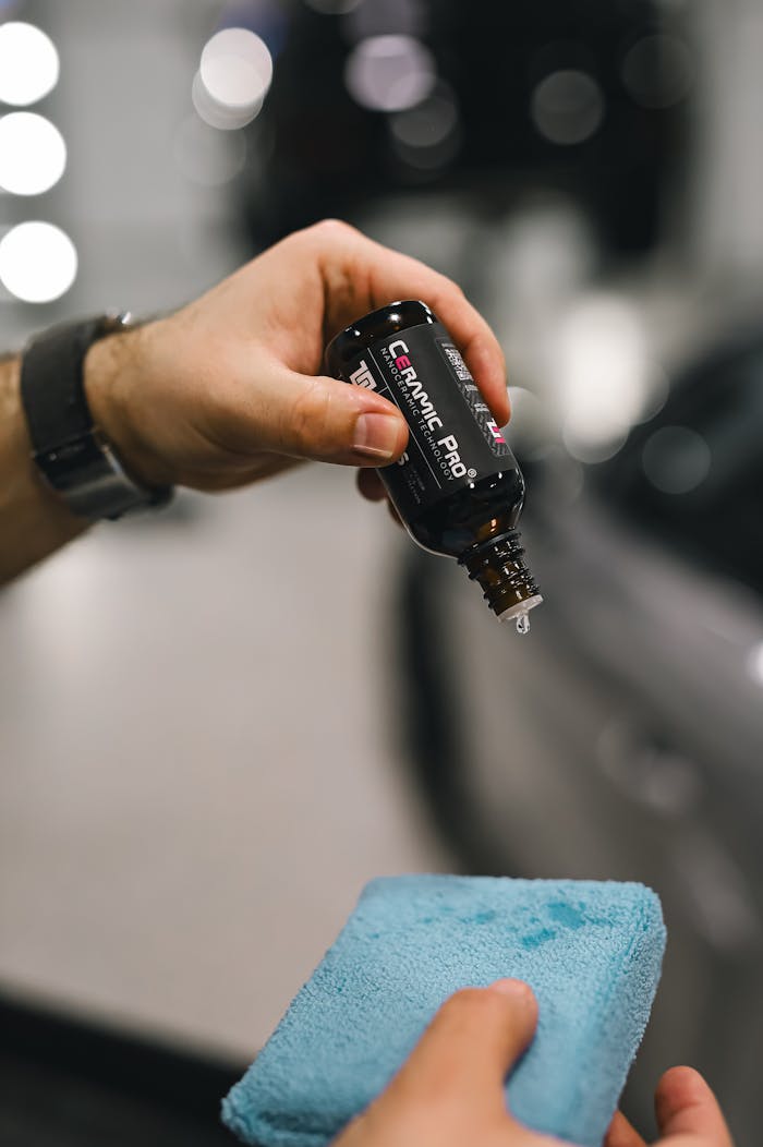 Applying Car Cleaner on Blue Sponge